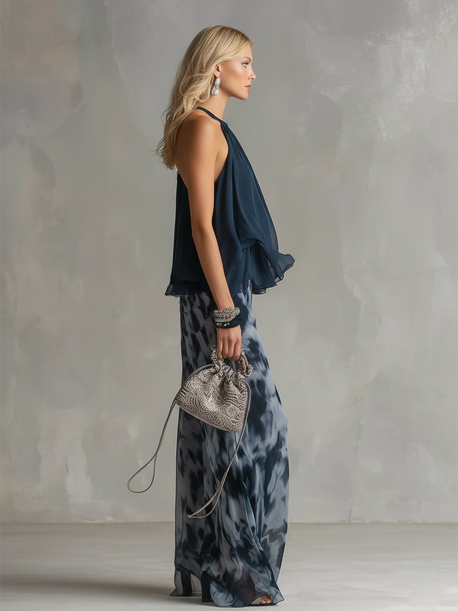 Conjunto elegante de top halter azul marino y pantalón ancho estampado de Ludovica.
