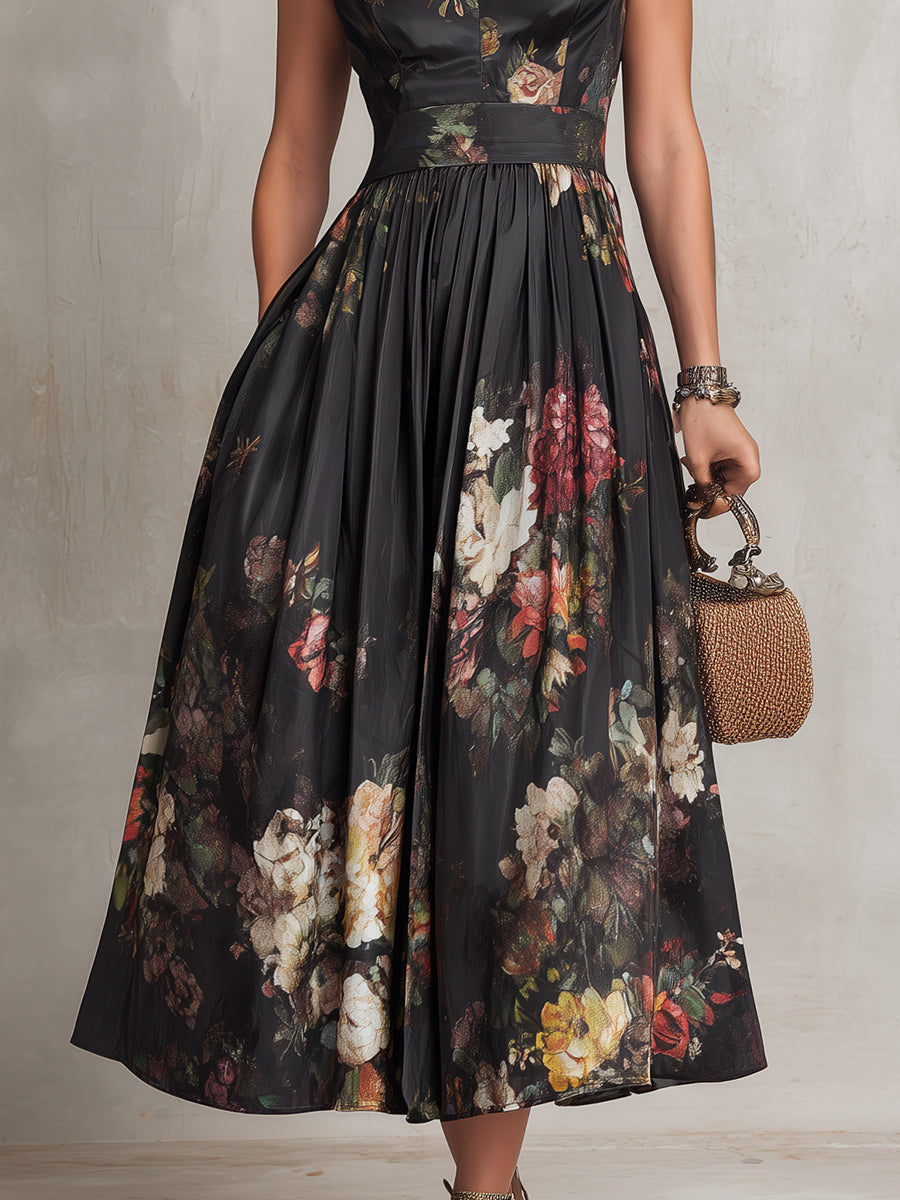 Vestido midi Violetta negro de satén plisado con motivo floral y escote con abertura.