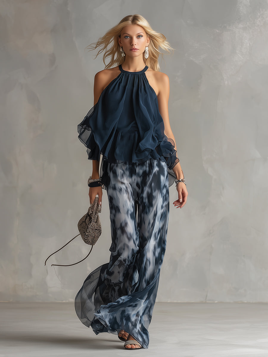 Conjunto elegante de top halter azul marino y pantalón ancho estampado de Ludovica.