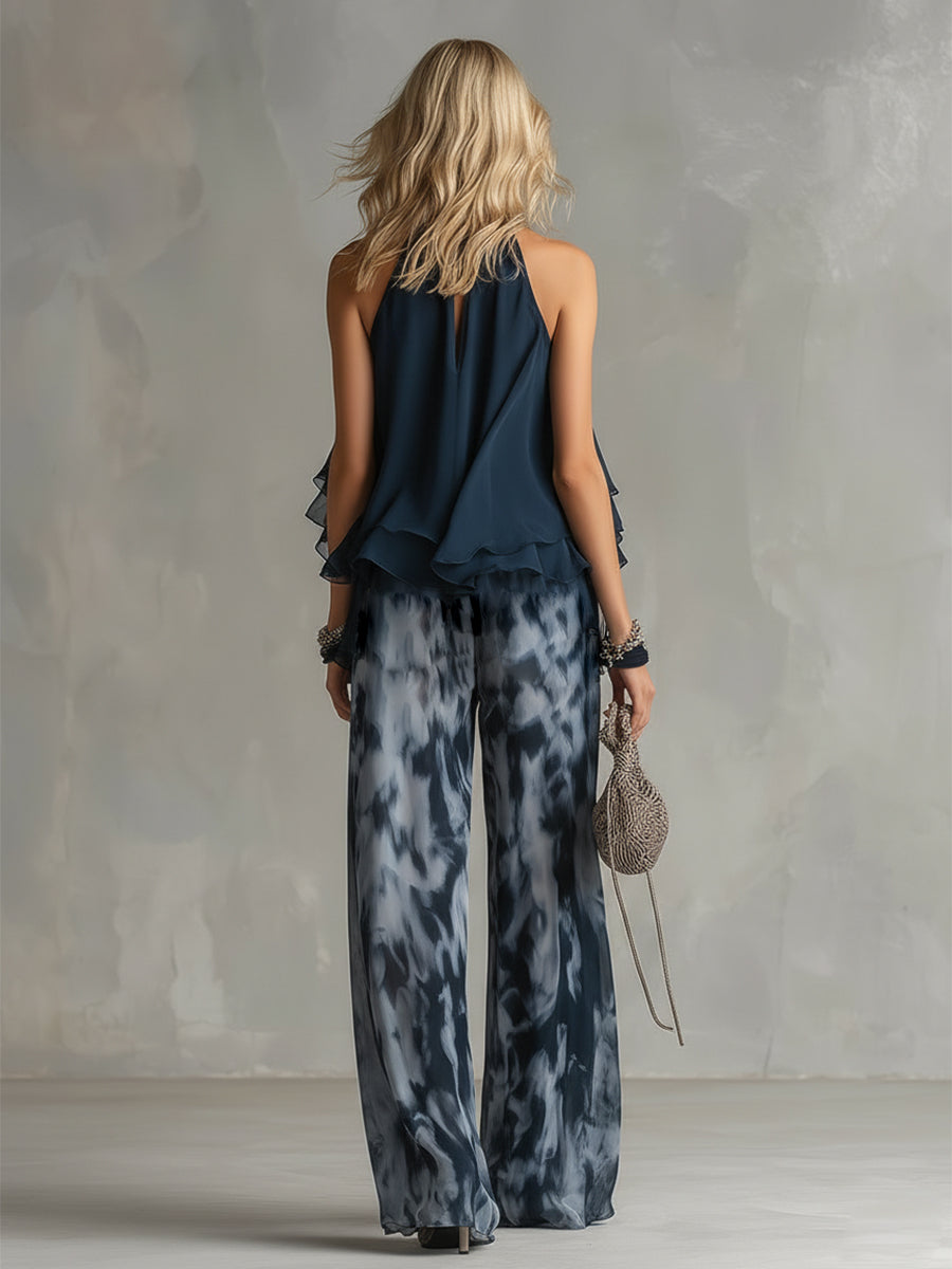 Conjunto elegante de top halter azul marino y pantalón ancho estampado de Ludovica.