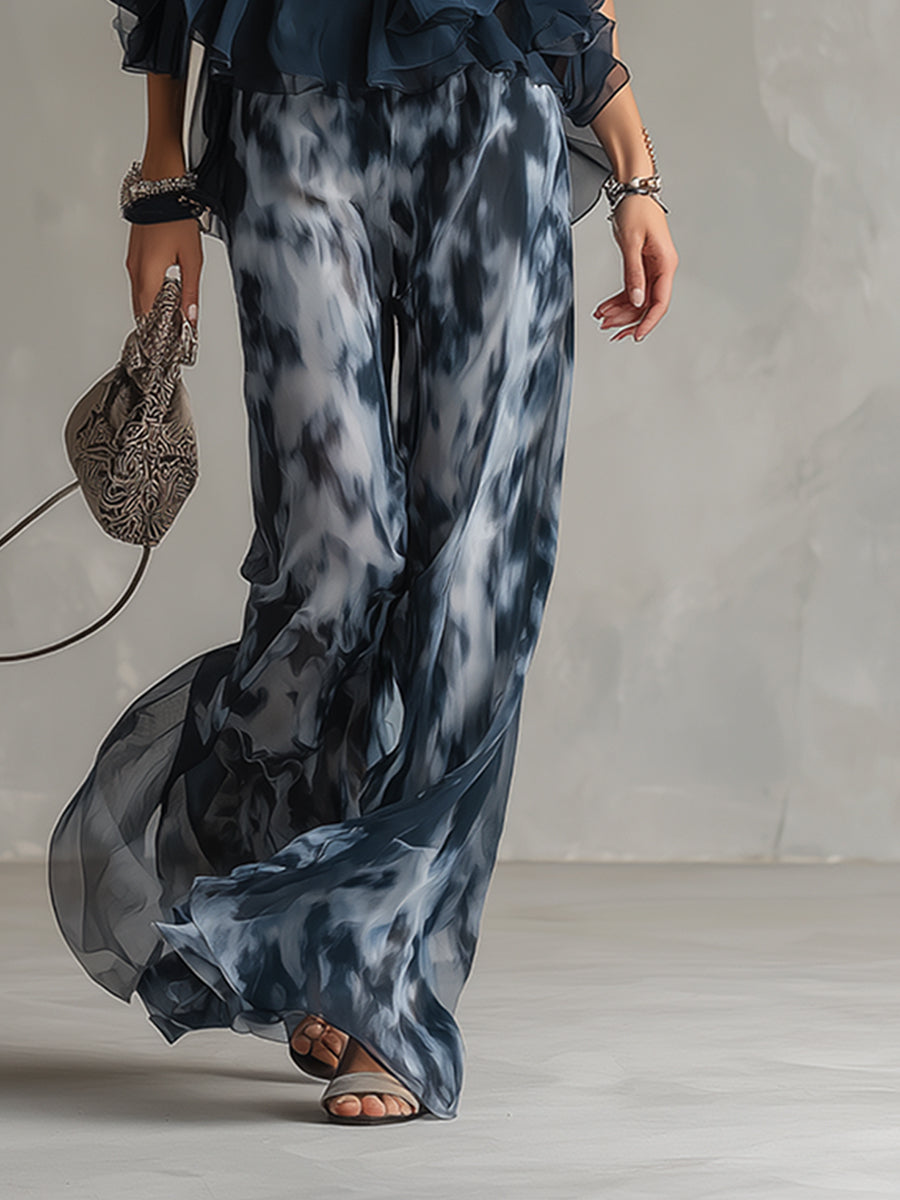 Conjunto elegante de top halter azul marino y pantalón ancho estampado de Ludovica.