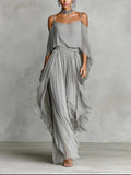 Conjunto Isabela gris fluido con top de tirantes finos y pantalón ligero.
